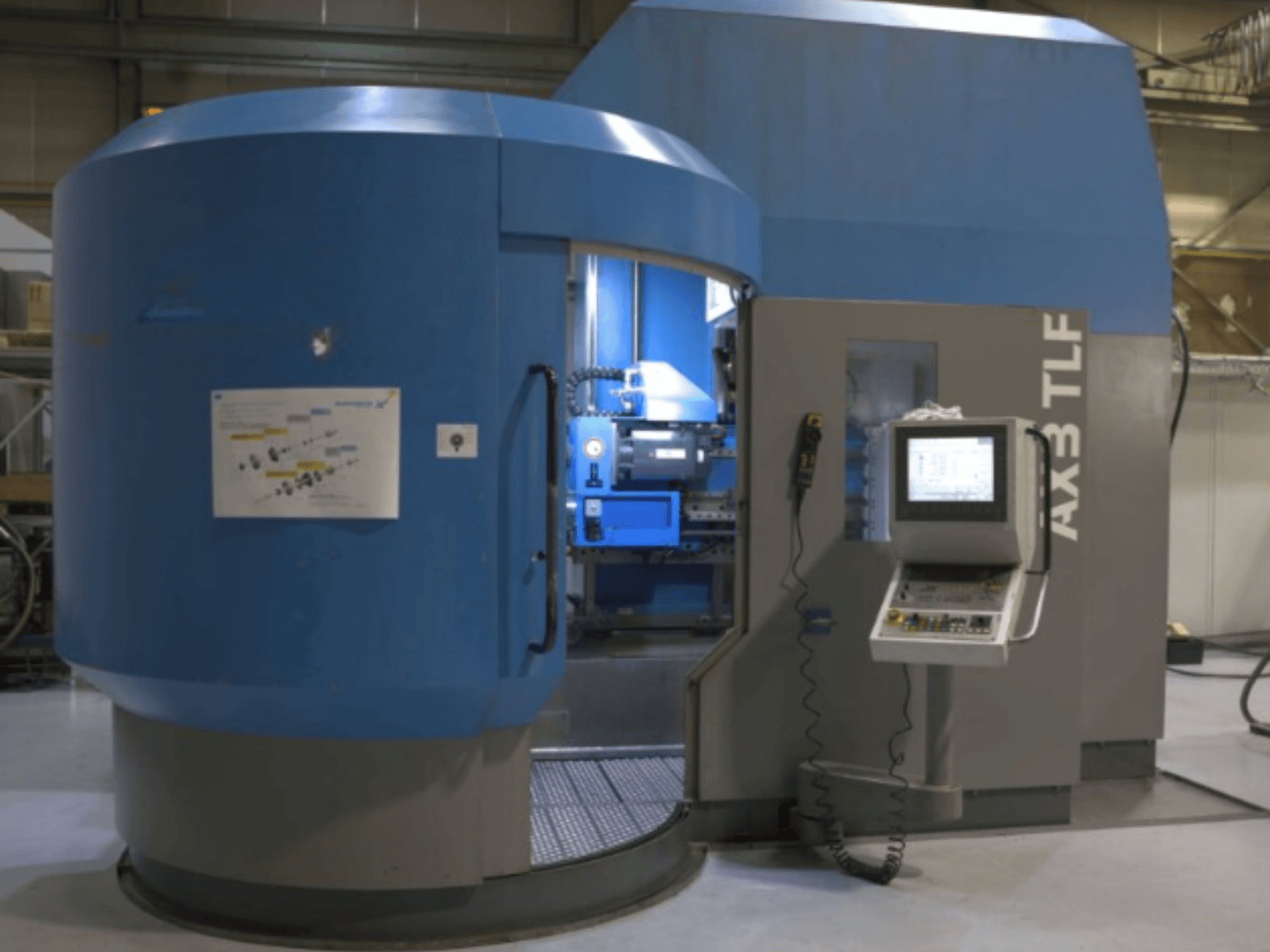 Sondaj makinesi IXION Auerbach IA2 TLF-1200.4 önden görünümde; kontrol paneli ve mavi gövde özellikleri.