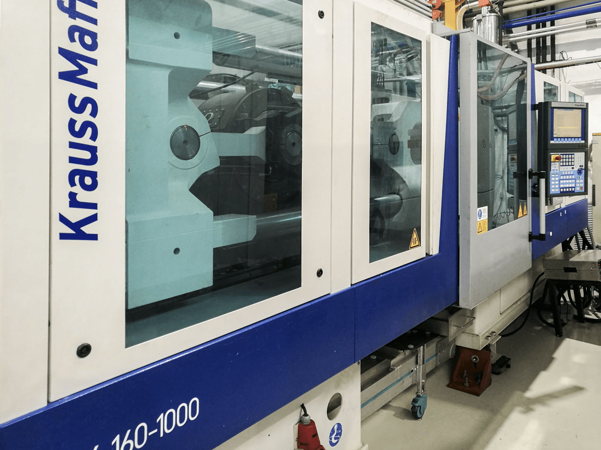 Makine Krauss Maffei - Sol görünüm 160-1000 EX