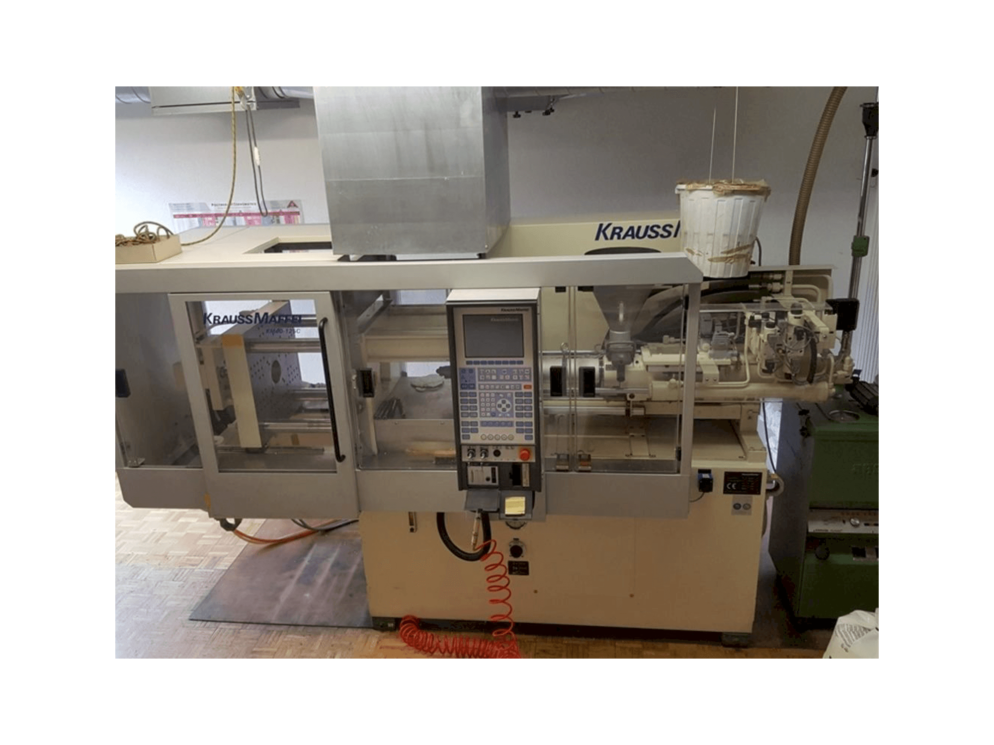 Makine Krauss Maffei 40-125 C Winner - Önden görünüm